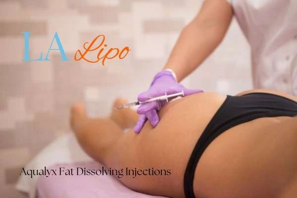 Woman having fat dissolving injections Oxford on thighs