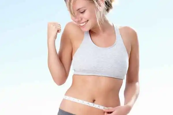 woman happy after fat reduction treatment Oxford