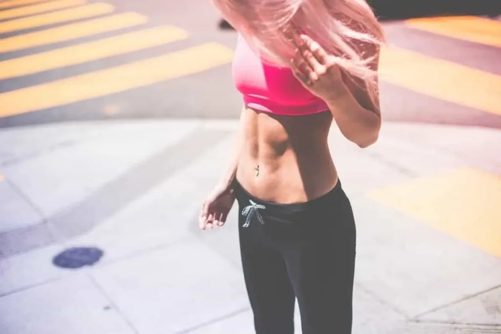 Woman with toned stomach after LA-EMS Body Sculpting Treatment Oxford